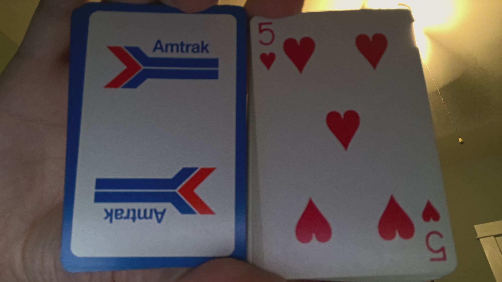 5 of hearts. From a vintage 1970s Amtrak playing card deck by USPC.