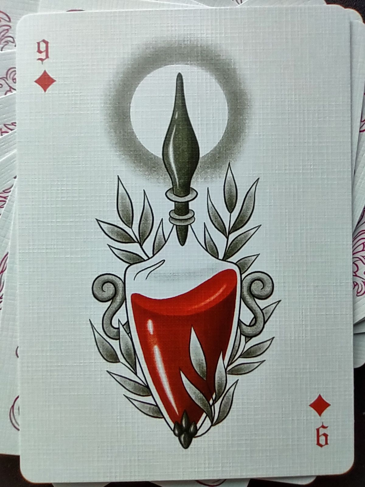 9 of diamonds. From the Bloom deck by Laura Marcuet.