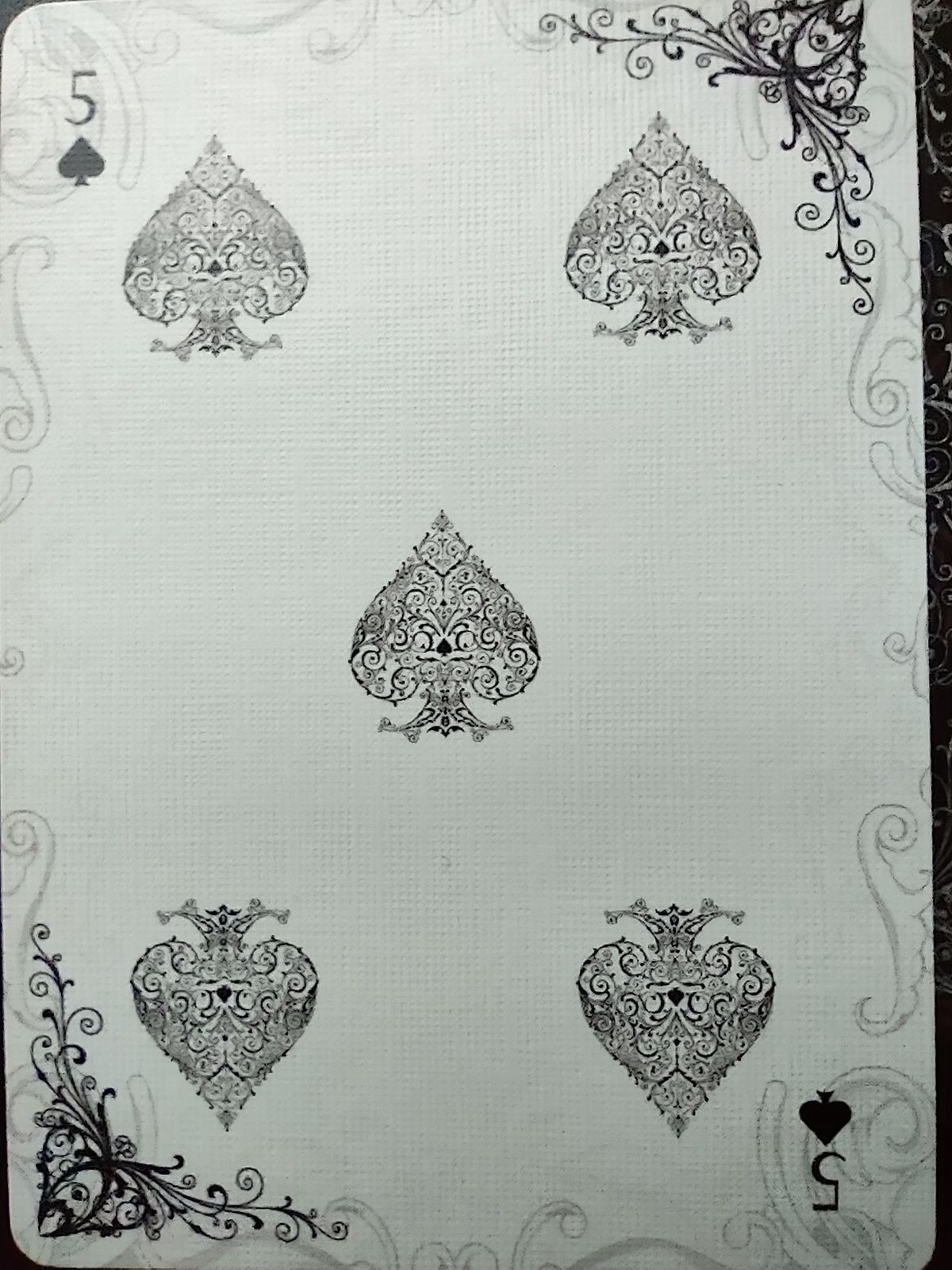 5 of spades. From the Divine deck by Bicycle.