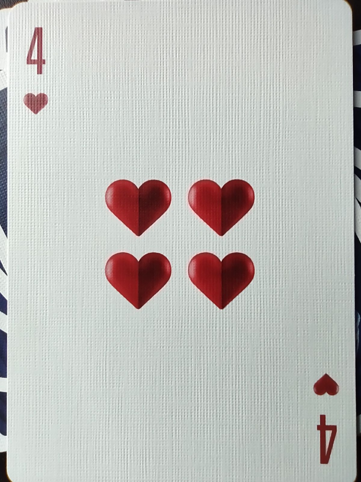 4 of hearts. From the Play Dead deck by Riffle Shuffle.