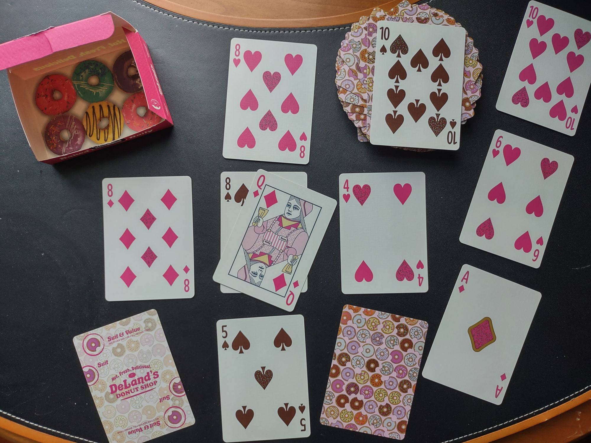 10 of spades. From the Deland's Donut Shop deck by Penguin Cards.